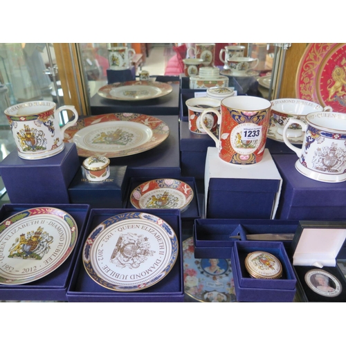 1233 - Twenty one items of Royal Memorabilia including a large amount of Worcester items, Dartington glass,... 