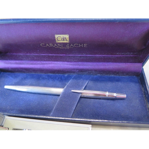 1250 - A silver/silver plate Caran D'Ache biro in box, Parker 61 fountain pen, rare Parker IIL ball point a... 