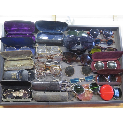 1370 - A large selection of vintage glasses and sunglasses - varying condition