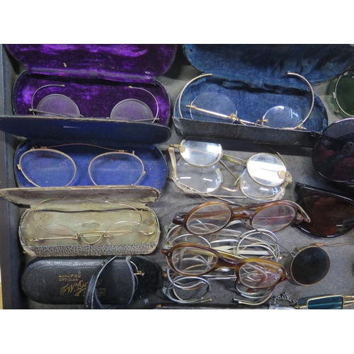 1370 - A large selection of vintage glasses and sunglasses - varying condition