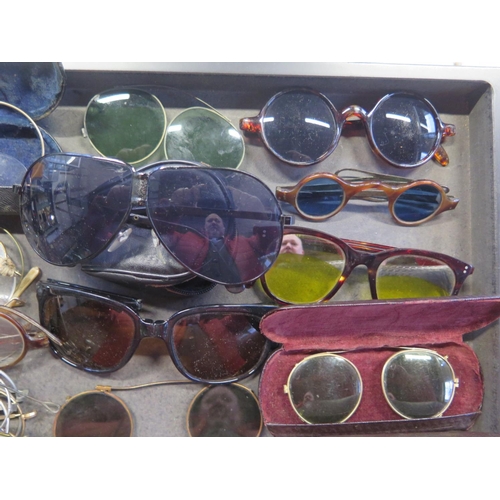 1370 - A large selection of vintage glasses and sunglasses - varying condition