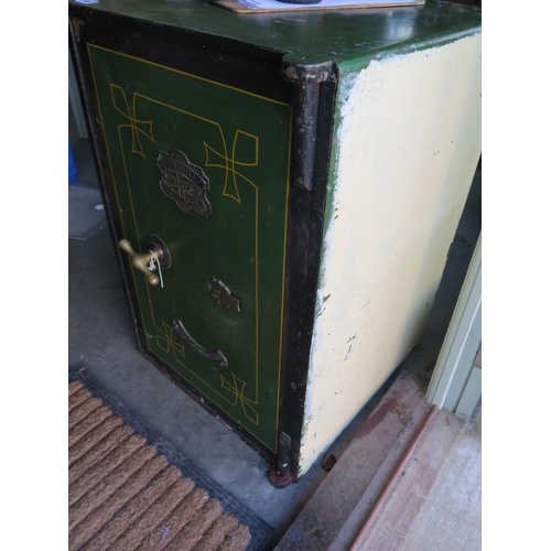 140 - A fire resistant safe by George Titterton with key - Height 77cm x 51cm x 54cm