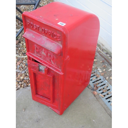 145 - A cast iron post box - 25cm x 35cm x 63cm high