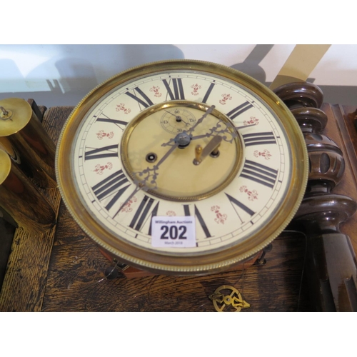 202 - A double weight Vienna wall clock movement intact but case needs resotration