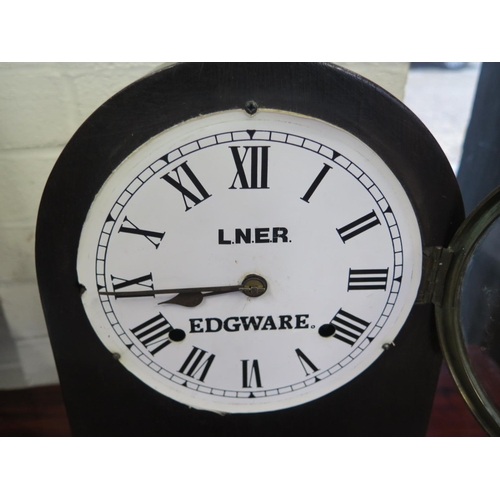 214 - An oak case mantle clock LNER Edgeware - Replacement plastic dial, working in the saleroom