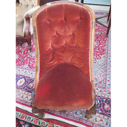 271 - A 19th century rosewood button back nursing chair