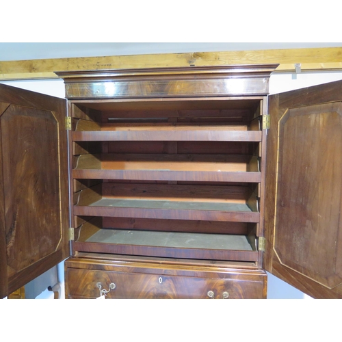 286 - A 19th century mahogany and inlaid linen press with four slides over the base with three drawers - 2... 