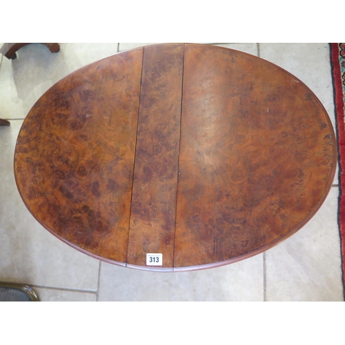 313 - An oval burr walnut Sutherland table - Height 52cm x 70cm x 50cm