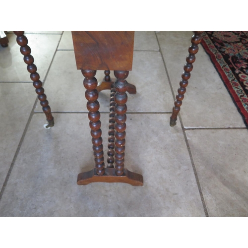 313 - An oval burr walnut Sutherland table - Height 52cm x 70cm x 50cm