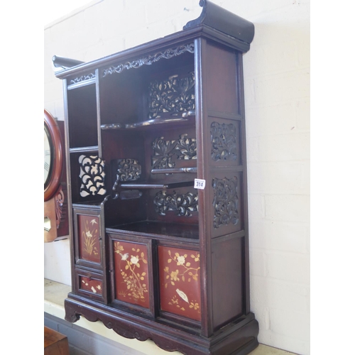 314 - An Oriental table cabinet with fretwork decoration with three lacquer decorated doors and a drawer -... 