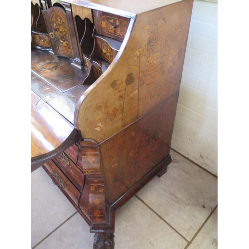 315 - An 18th century Dutch marquetry inlaid walnut and mahogany two piece bombe front bureau, the fall fl... 