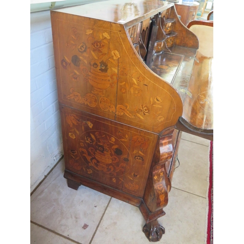 315 - An 18th century Dutch marquetry inlaid walnut and mahogany two piece bombe front bureau, the fall fl... 