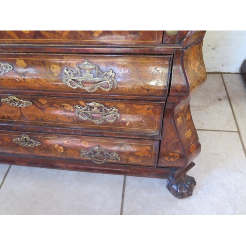 315 - An 18th century Dutch marquetry inlaid walnut and mahogany two piece bombe front bureau, the fall fl... 