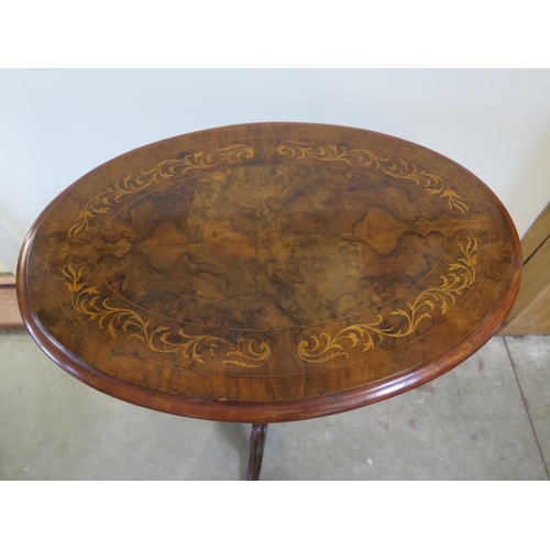 318 - A Victorian inlaid walnut tilt top side table on a tripod base in restored condition - Height 72cm x... 