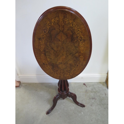 318 - A Victorian inlaid walnut tilt top side table on a tripod base in restored condition - Height 72cm x... 