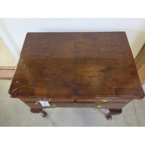 325 - A Georgian walnut three drawer lowboy on cabirole legs and pad feet in restored condition - Height 7... 