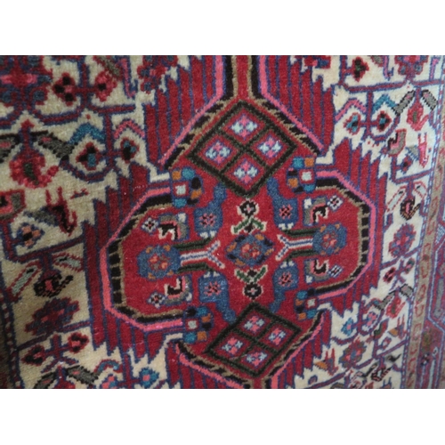 406 - A hand knotted woolen Hamadan runner - 2.58m x 0.80m