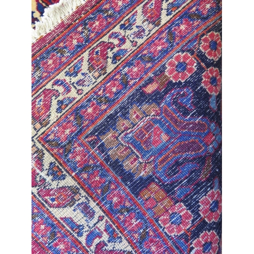 414 - A hand knotted woolen Meshed rug - 4.06m x 3.14m