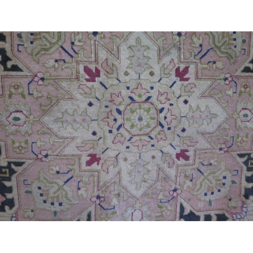 436 - A hand knotted Tabriz carpet - 195cm x 154cm - 500 knots per square inch - in good condition