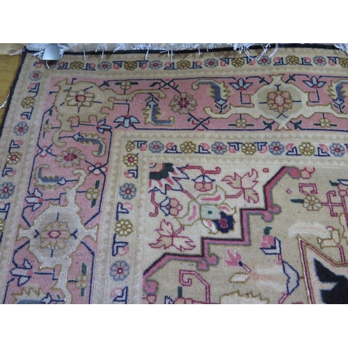 436 - A hand knotted Tabriz carpet - 195cm x 154cm - 500 knots per square inch - in good condition