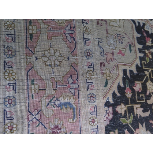 436 - A hand knotted Tabriz carpet - 195cm x 154cm - 500 knots per square inch - in good condition