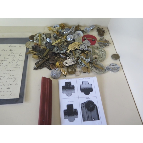 508 - A quantity of Military uniform buttons, cap badges and associated items including postcards, photogr... 