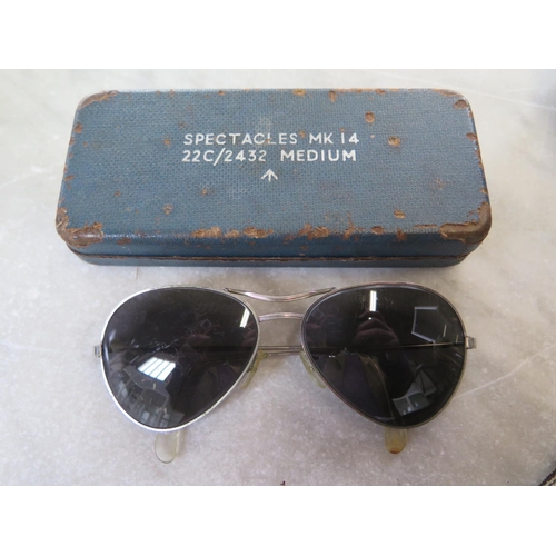 515 - A Sam Browne belt, a pair of English goggles and a MK 12 22C/2432 medium sunglasses with case