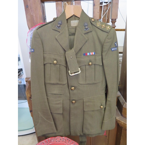 521 - A British Army uniform WWII period Captain Stonehouse Royal Artillery, uniform to include - battle d... 