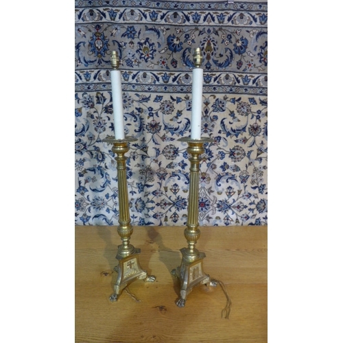 1371 - A large pair of gilt metal lamps made from converted church candlesticks - 92cm tall