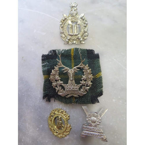 542 - Four Scottish Regimental cap badges to include Argyle Light Infantry, Lowland Regiment, Kings Scotti... 