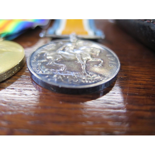 554 - A World War I 1914/18 Medal, Victory Medal and Death Plaque awarded to 33108 Pte G. Argent Boarder R... 