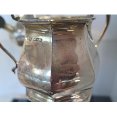 651 - A silver coffee/water jug London 1869/70 CS & HS - approx weight 19.7 troy oz and a similar milk and... 