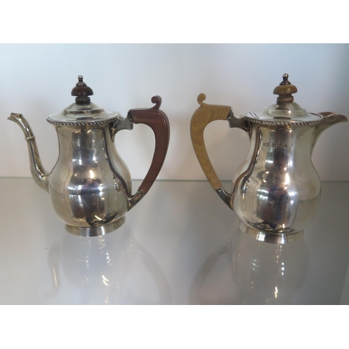 654 - A Mappin and Webb silver teapot and water jug Birmingham 1926/27 - Height 14cm - approx total weight... 