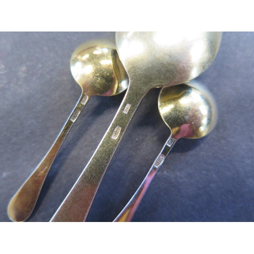 663 - A Russian gilt 875 silver enamel teaspoon - Length 11.5cm - and two Russian gilt 875 silver salt spo... 