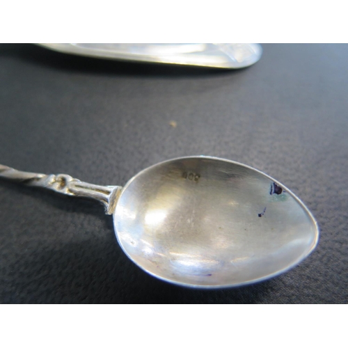 664 - Ten pieces of 800 silver K Meyen & Co flatware, an anointing spoon marked 84 and five other white me... 