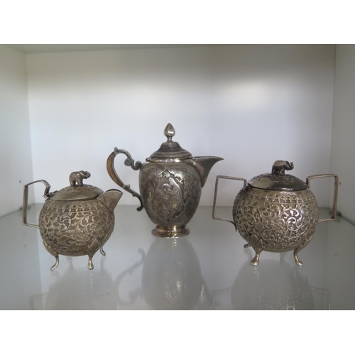 665 - An Indian silver teapot - Height 15cm - and a small Indian silver teapot and a lidded bowl - total s... 