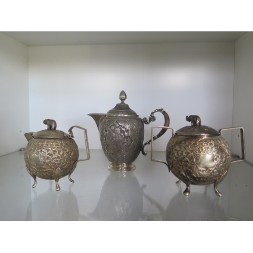 665 - An Indian silver teapot - Height 15cm - and a small Indian silver teapot and a lidded bowl - total s... 