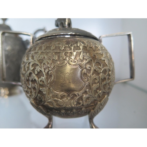 665 - An Indian silver teapot - Height 15cm - and a small Indian silver teapot and a lidded bowl - total s... 