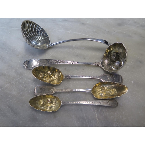 677 - Three Georgian silver berry spoons, a berry ladle and a strainer spoon - approx weight 4.4 troy oz -... 