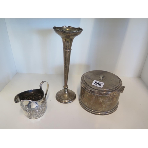 686 - A silver lidded pot with weighted base, a silver jug and a silver vase with weighted base - weighabl... 