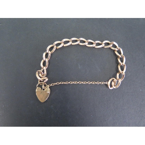 756 - A 9ct rose gold bracelet chain link with heart shaped clasp - approx weight 20.5 grams - in generall... 