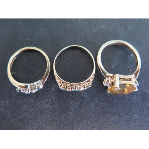 785 - Three 9ct yellow gold rings sizes I, M & M - approx total weight 7.5 grams - some light usage marks