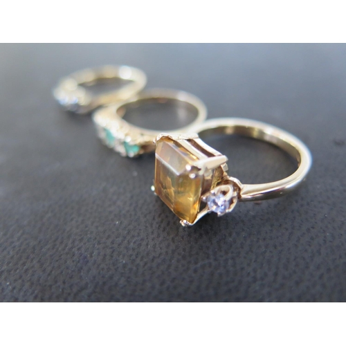 785 - Three 9ct yellow gold rings sizes I, M & M - approx total weight 7.5 grams - some light usage marks