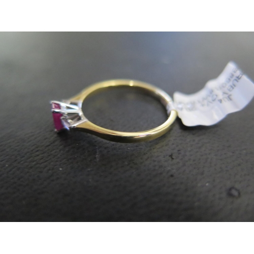 796 - An 18ct white gold ruby and diamond ring - approx weight 2.2 grams - ring size O - ex jewellers stoc... 