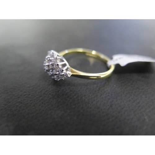 802 - An 18ct yellow gold diamond cluster ring - approx diamond weight 0.52ct - ring size N - approx weigh... 