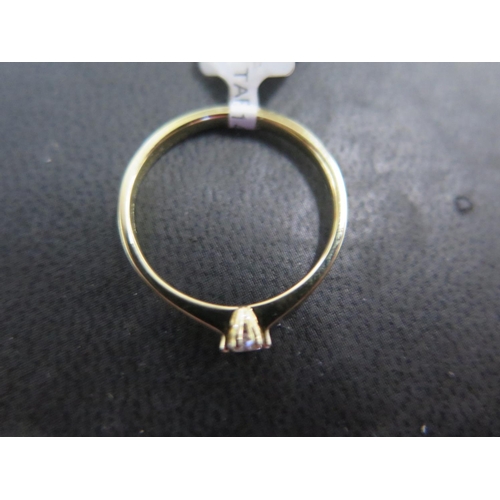 805 - A 14ct yellow gold diamond solitaire ring - approx diamond weight 0.10ct - ring size P - approx weig... 