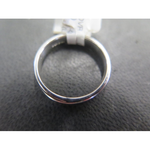 807 - A platinum crossover band ring size L/M - approx weight 5.8 grams - ex jewellers stock, in new unuse... 