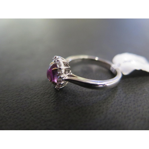 808 - An 18ct white gold cabochon purple sapphire and diamond cluster ring - approx weight 1.08ct - ring s... 