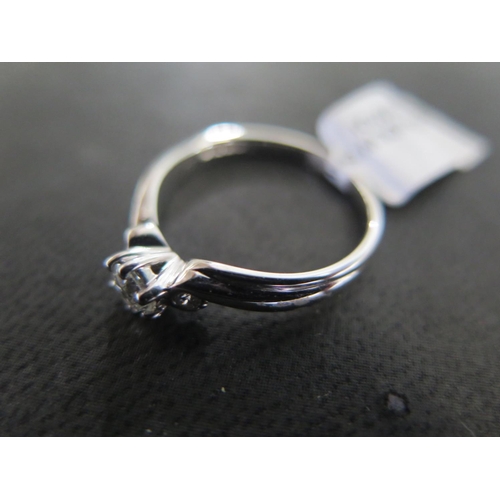 822 - An 18ct white gold diamond ring - approx diamond weight 0.25ct - ring size N - approx weight 3 grams... 