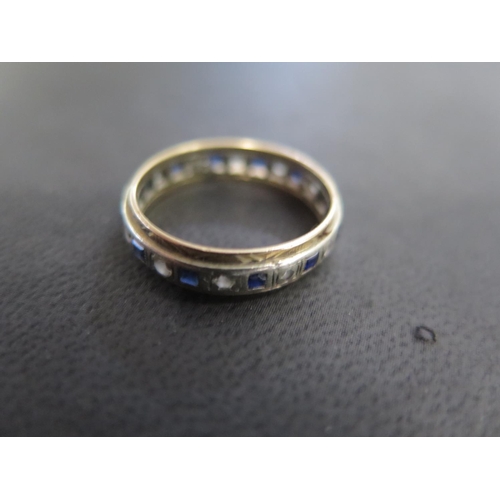 838 - A 9ct yellow and white gold eternity ring size R - approx weight 3 grams - some surface scratches an... 